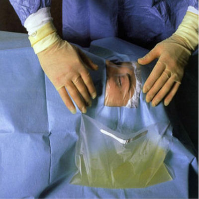Хирургический лист глаза фенестрации задрапировывает с интегрированной жидкой сумкой собрания